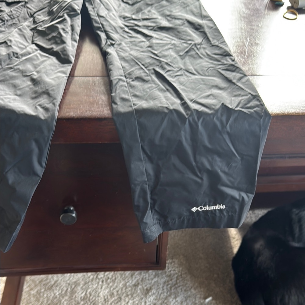 Columbia Black rain pants.  Youth medium